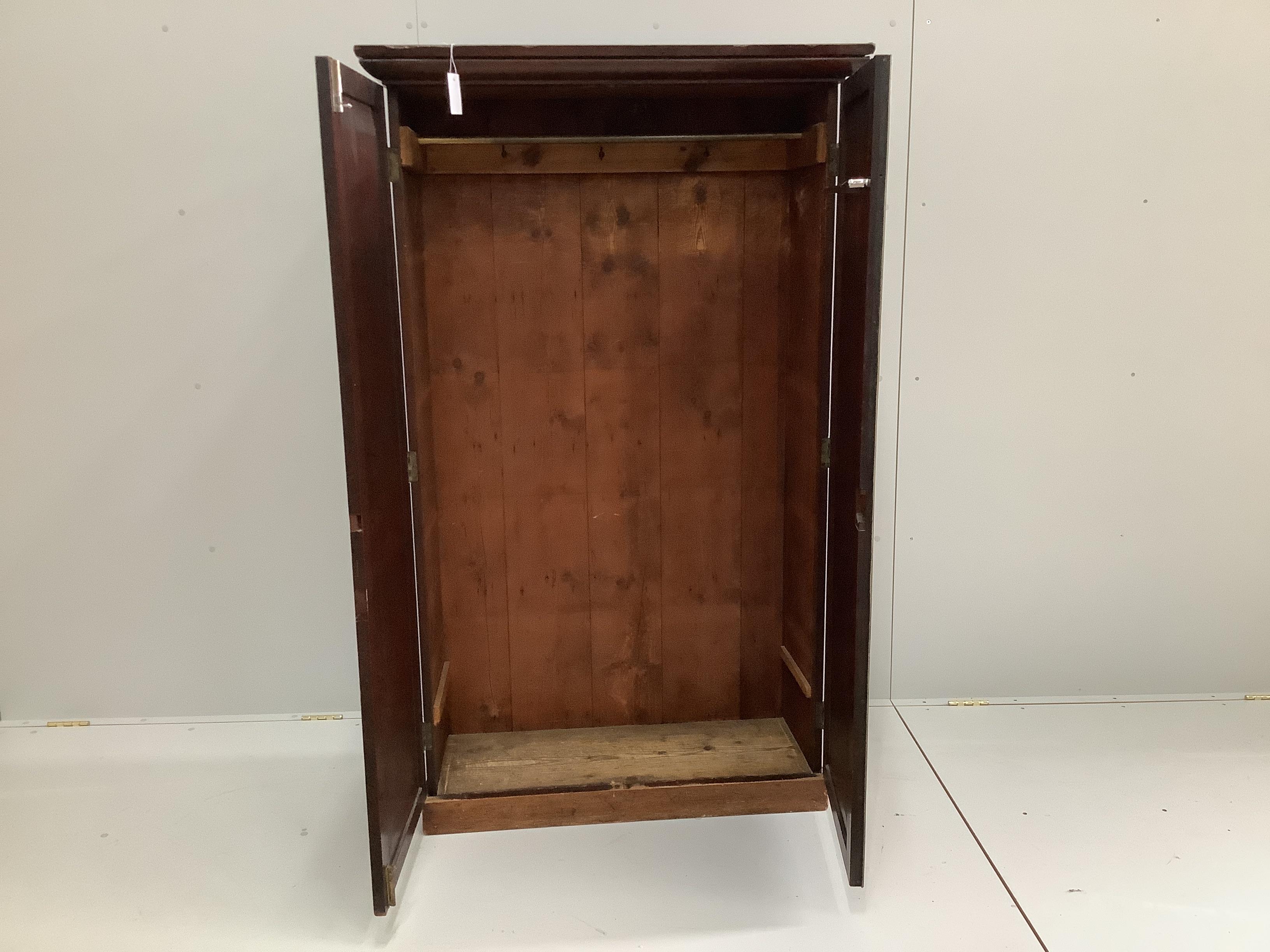 An early 19th century mahogany hanging cupboard, adapted, width 97cm, depth 40cm, height 162cm